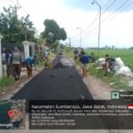 Kegiatan Pengaspalan Jalan Kampung Baru
